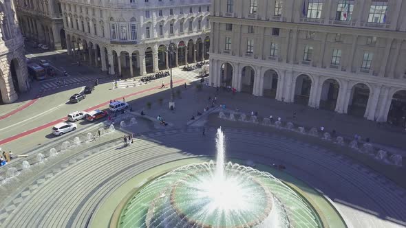 Aerial panoramic drone view of Fountain in main square of city Piazza De Ferrari in Genoa,Italy. 4K