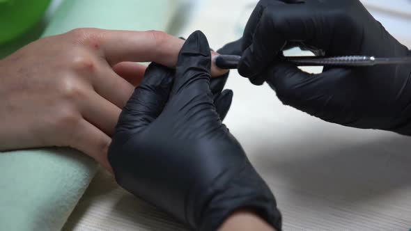 Manicure Master Cleaning Clients Nails Before Applying Nail-Polish, Beauty Salon