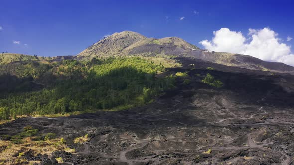 Landscape of the Humid Tropical Rainforest and Black Lava Field Around the Majestic on Volcano Batur