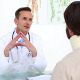 Doctor Talking With His Patient In A Neck Brace - VideoHive Item for Sale