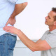 Physiotherapist Rubbing Patients Lower Back - VideoHive Item for Sale