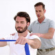 Physiotherapist Checking Patient Pulling A Band - VideoHive Item for Sale
