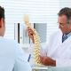 Mature Doctor Talking To His Patient About Spine - VideoHive Item for Sale
