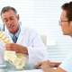 Mature Doctor Speaking To His Patient About Spine - VideoHive Item for Sale