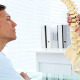 Patient Listening To His Doctor Explain Spine - VideoHive Item for Sale