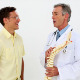 Doctor Holding Spine Model Talking To Patient - VideoHive Item for Sale