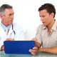 Patient Listening To His Doctor Holding Clipboard - VideoHive Item for Sale