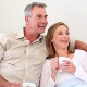 Couple Drinking Coffee On The Couch 2 - VideoHive Item for Sale