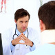 Doctor Speaking To Patient With A Neck Injury - VideoHive Item for Sale