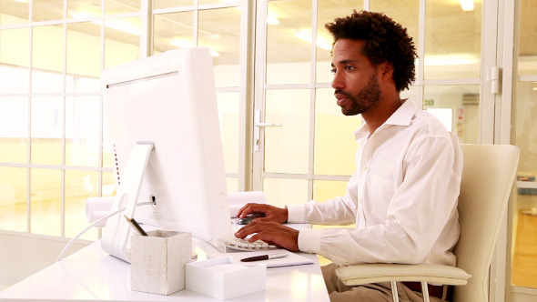 Businessman Working At His Desk 4