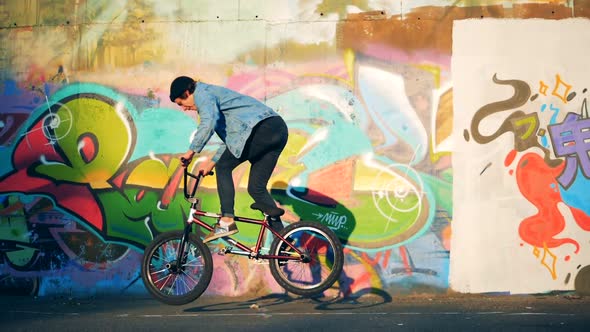 Man Turns Handlebar While Jumping