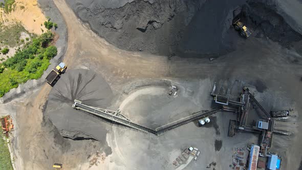 Aerial of Asphalt and Cement Factory Large Piles of Construction Rocks Used for Asphalt Production