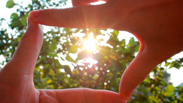 Hands Join Together To Make Finger Framing