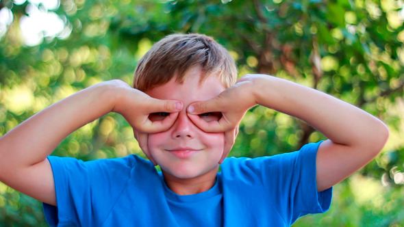 Cute Boy Watch Right With His Hand