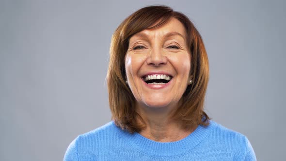 Portrait of Happy Senior Woman Laughing 4