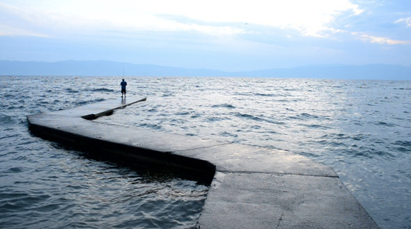 Fisherman on a  Dock