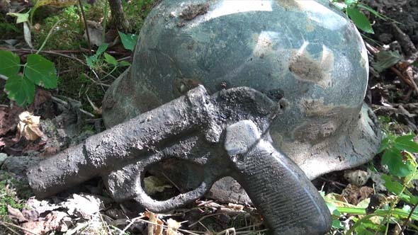 German Helmet And Flare Gun