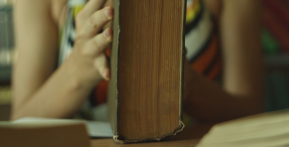 Girl Opens a Book alt