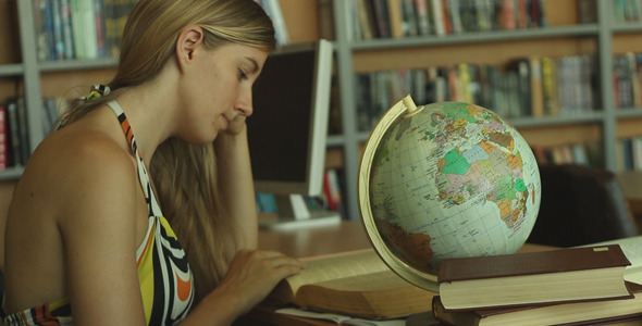 Girl Leafing Through The Book alt