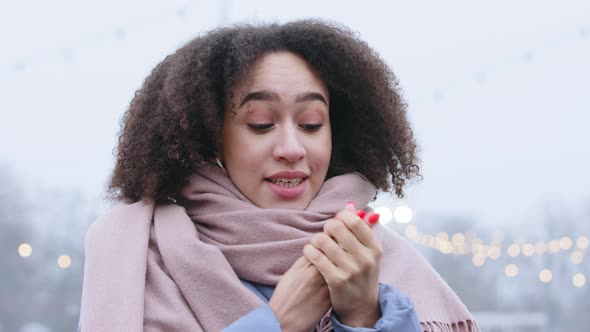 Portrait of Afro American Girl with Curly Hairstyle Feels Cold Standing Alone at City Street in