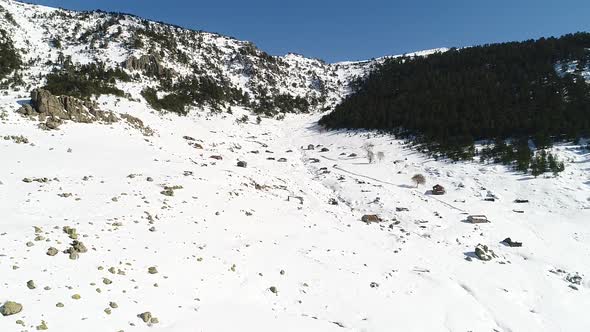 Highland and highland houses with snow in winter.