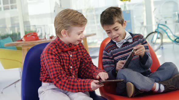 Kids as business executives using digital tablet 4k