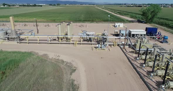 Flying over part of an oil frack pad.