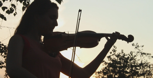 Girl Playing The Violin in The Woods