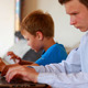 Two Brothers Using Laptop And Smartphone 4 - VideoHive Item for Sale