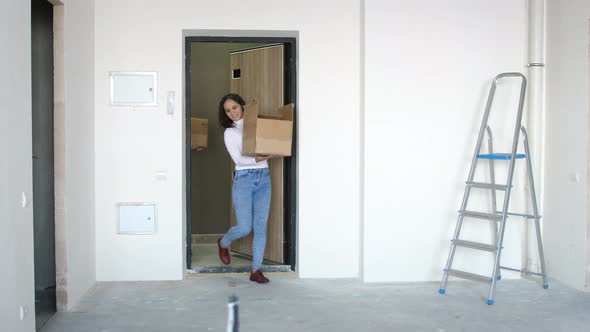 A Young Couple Moving Into a New Home