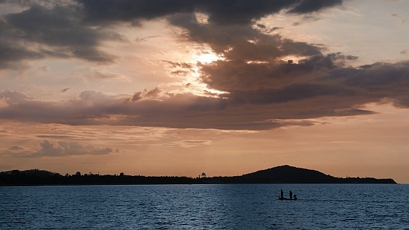 Traditional Thai Boat Sails Over the Sea. 