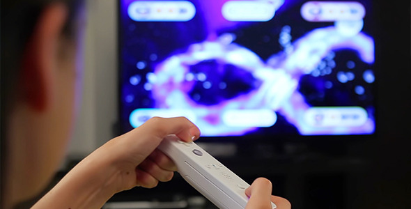 Teenage Girl Playing Video Games on Smart TV