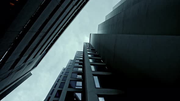 Abstract and Complex Blue Skyscraper Structure Downtown in Montreal with Sky in Background