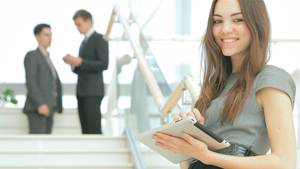 Beautiful Business Woman Smiling at the Camera