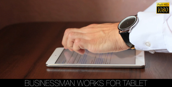 Businessman Works For Tablet