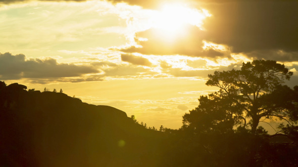 Glare of the Sun Through the Clouds  alt