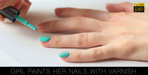 Girl Paints Her Nails With Varnish