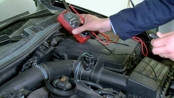 Car Repair Voltmeter Checking