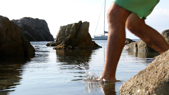 Walk Through the Beach Splashing Water