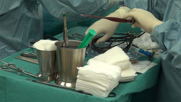 Surgery Operation And Nurse's Hand