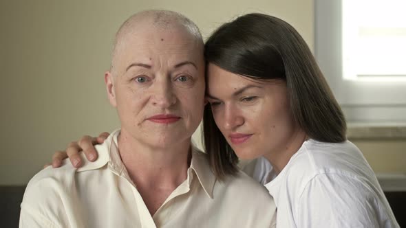 Young Woman Hugs Her Sick Mom After Chemotherapy