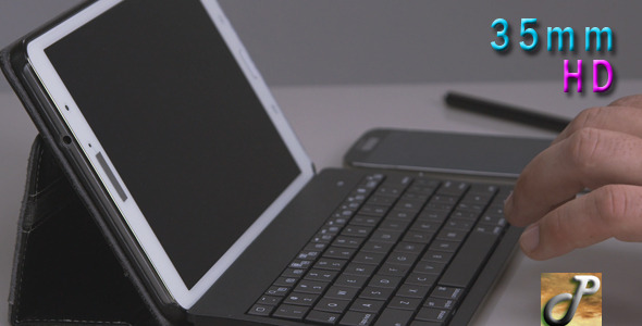 Man Hands Using Tablet Keyboard