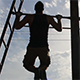 Strong Man doing Pull Ups under the Sun - VideoHive Item for Sale
