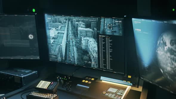 Futuristic military drone is tracking the moving vehicle from a long distance alt