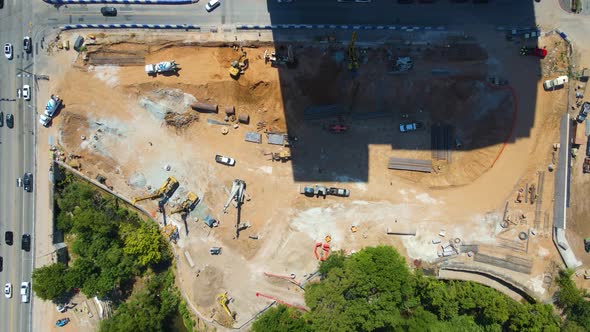 Fast time lapse of construction job site near heavy car traffic in Austin, Texas.