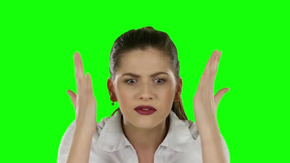 Angry Female Destroying Contract. Green Screen