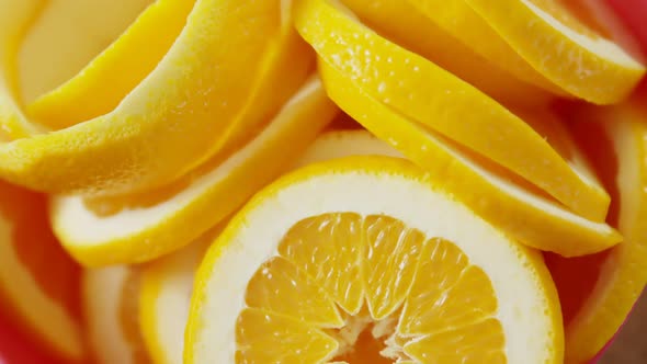 Halved and peel sweet limes in bowl