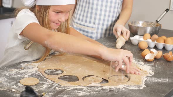 Mother and Child Daughter Preparing the Dough, Bake Cookies, Close Up.