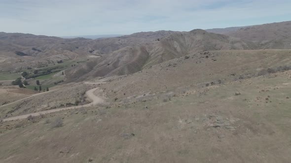 Flying above arid landscape