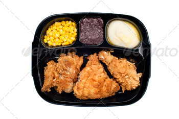 Chicken TV dinner in plastic tray